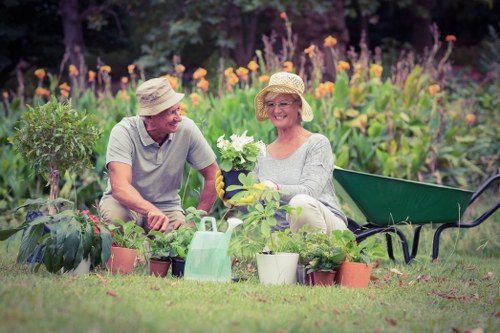 Landscapers Merton team using protective equipment during garden clearance