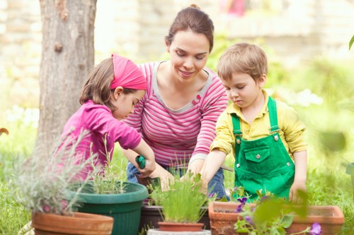 Local landscape gardeners planning a garden layout in Merton